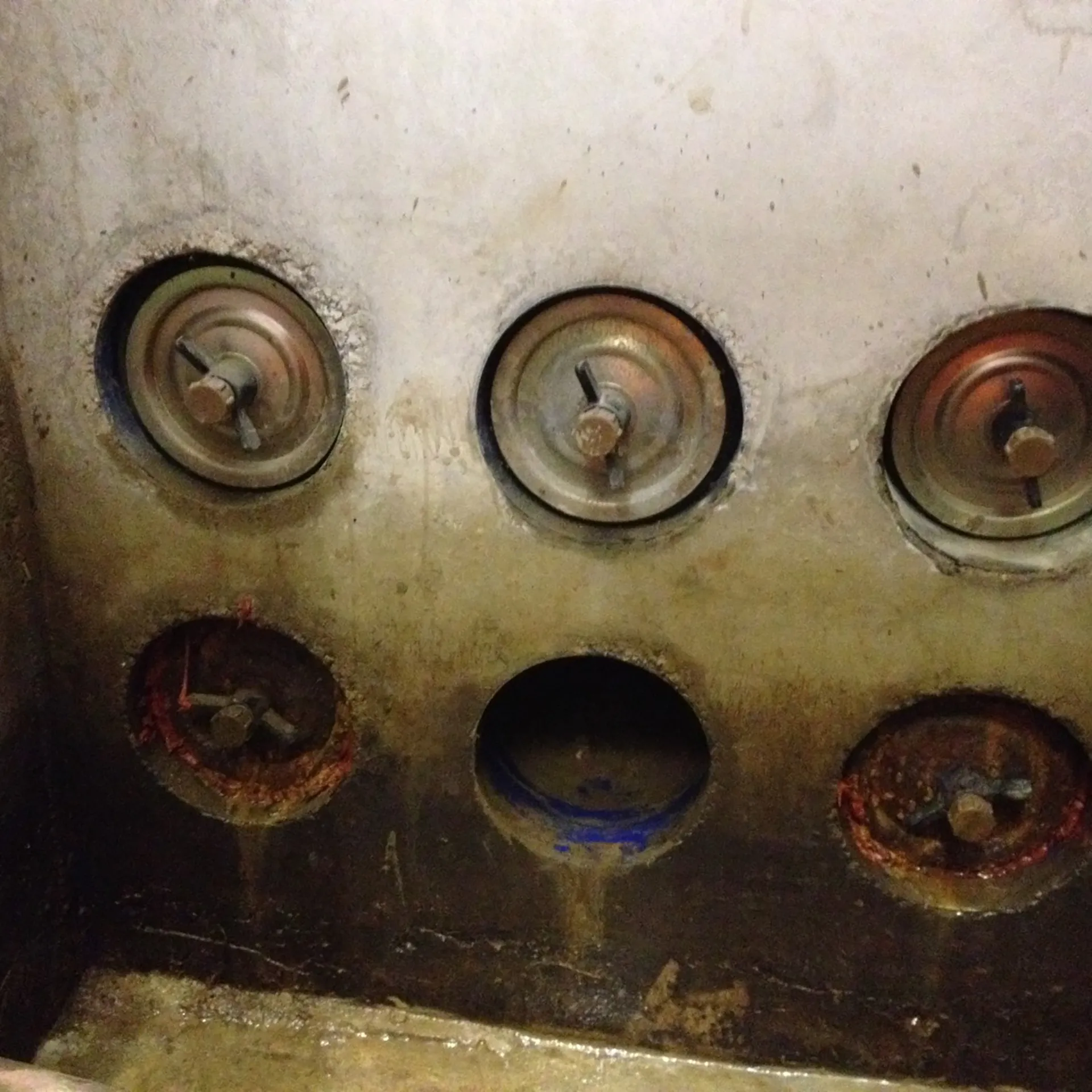 temporary bungs allowing water penetration and corroding badly